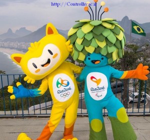 In this photo released by Rio 2016 Organizing Committee for the Olympic and Paralympic Games, the mascots of Rio 2016 Olympic, left, and Paralympic Games pose for a photo at the Leme Fort, with Copabana beach, left, in the background, in Rio de Janeiro, Brazil, Sunday, Nov. 23, 2014. The Mascots are inspired by the Brazilian fauna and flora. (AP Photo/Rio 2016, Alex Ferro)